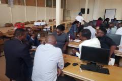 Participants working in groups during the training