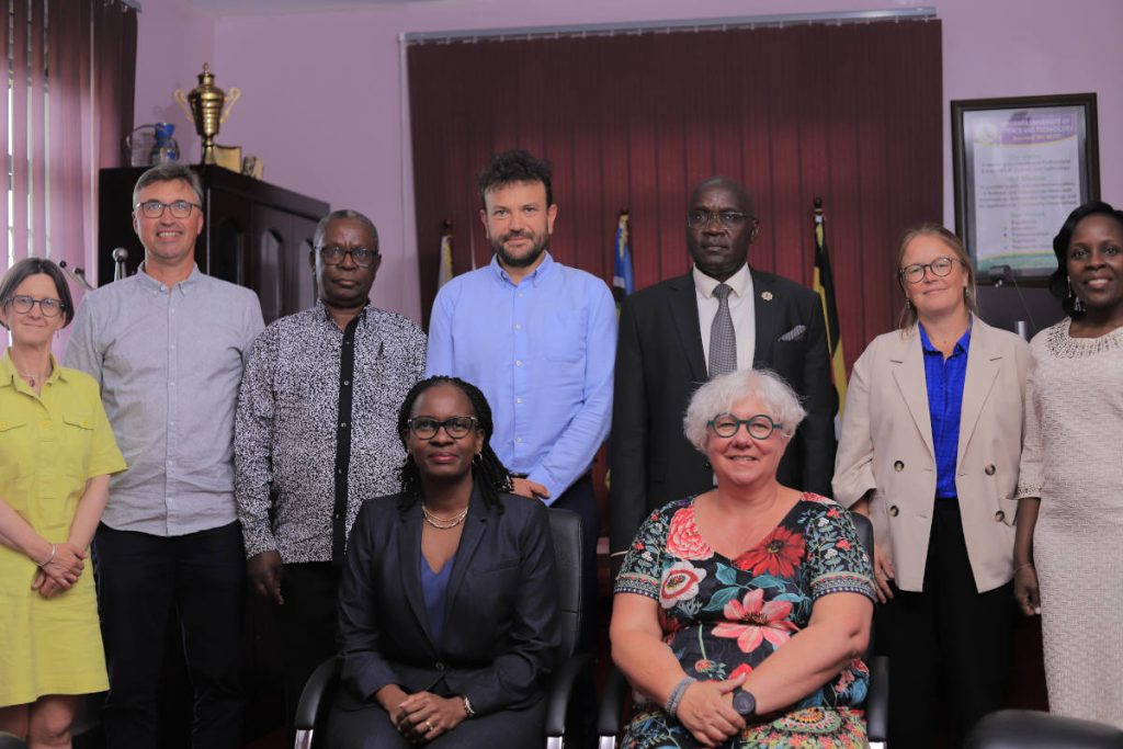 Seated L-R: Prof. Pauline Byakika Kibwika, Prof. Mieke Van HerrewegheStanding L-R: Dr. Annelies Verdoolaege, Mr. Liven Theys, Assoc. Prof. Charles Tushabomwe-Kazooba, Dr. Robin Stevens, Prof. Nixon Kamukama, Ms. Katelijne Demeyere, Ms. Sheila Niinye Twinamatsiko