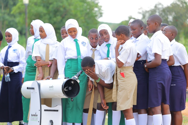 Some of the students having a moment with the telescope. It was such an excitingmoment for them.