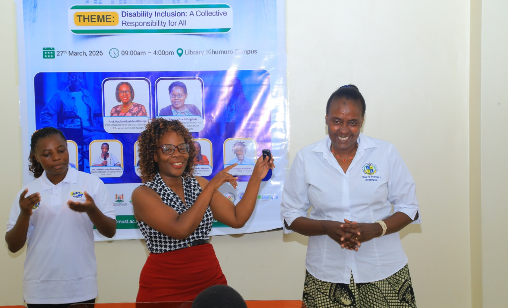 L-R Kasweet Amooti sign language interpreter, Ms. Angella Nakato Moderator, Ms. Maureen Kahima Deputy Dean of Students.