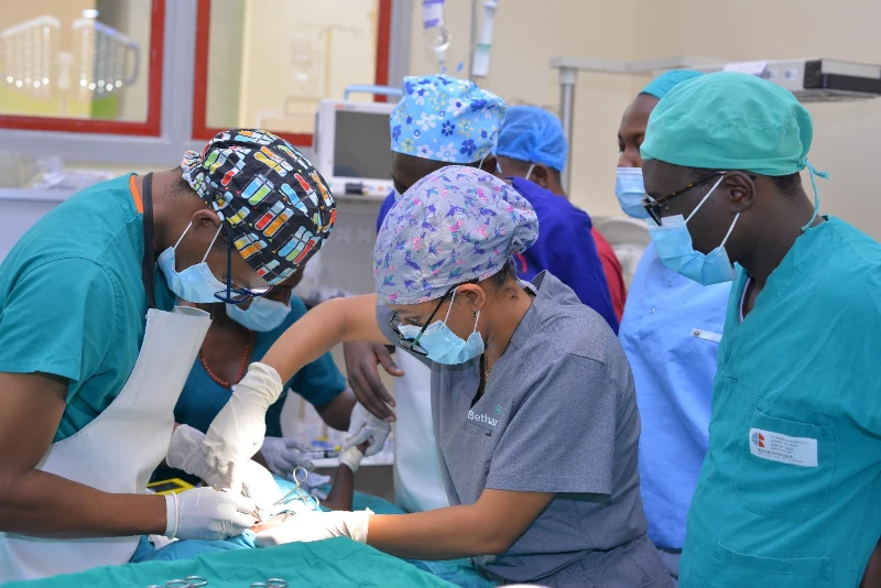 Restoring health and hope in Karamoja: Dr. Albert Muhumuza, working alongside paediatric surgeon Dr. Eden, performs a successful herniotomy on a 2-year-old who had endured the condition for half his life. Precision, partnership, and passion in every procedure.